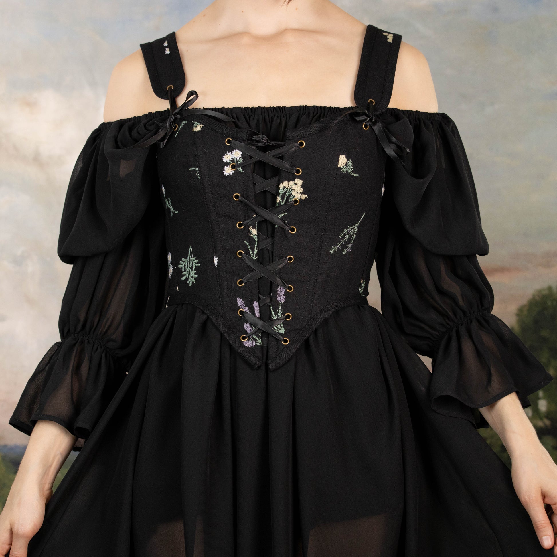 Black Chiffon Long Sleeve Chemise with floral embroidered bodice, off-shoulder design, lace-up front, and flowing sheer fabric