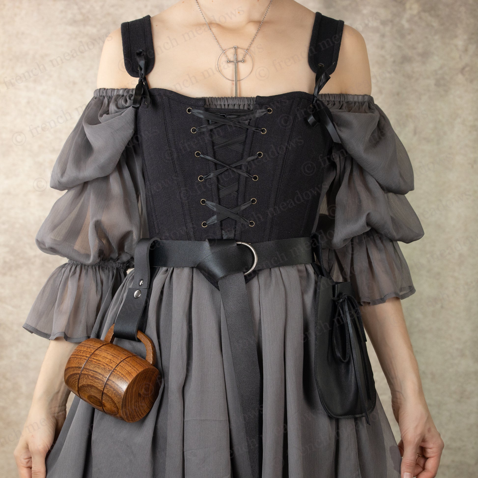Vegan leather tankard strap shown on medieval dress with wooden mug, perfect for renaissance faire costumes