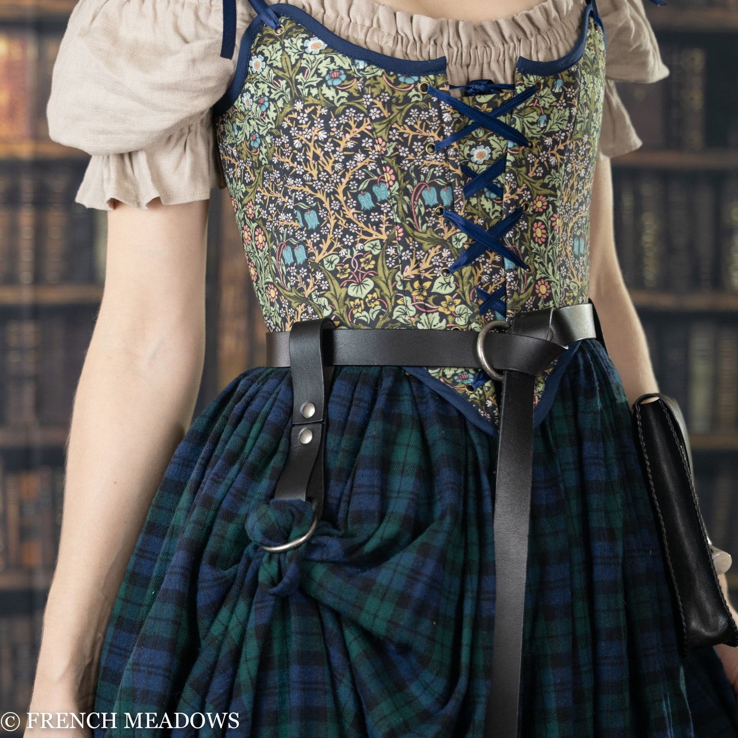 Leather skirt hikes on tartan renaissance dress with floral bodice and belt loops for adjustable skirt elevation