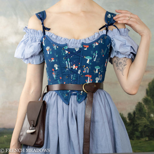 Blue Mushroom Renaissance Bodice featuring whimsical mushroom print, off-shoulder design, and blue cotton fabric with front lacing