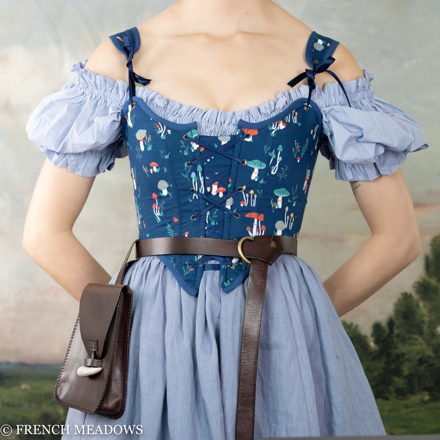 Blue Mushroom Renaissance Bodice with whimsical mushroom print, off-shoulder ruffled sleeves and lace-up front design