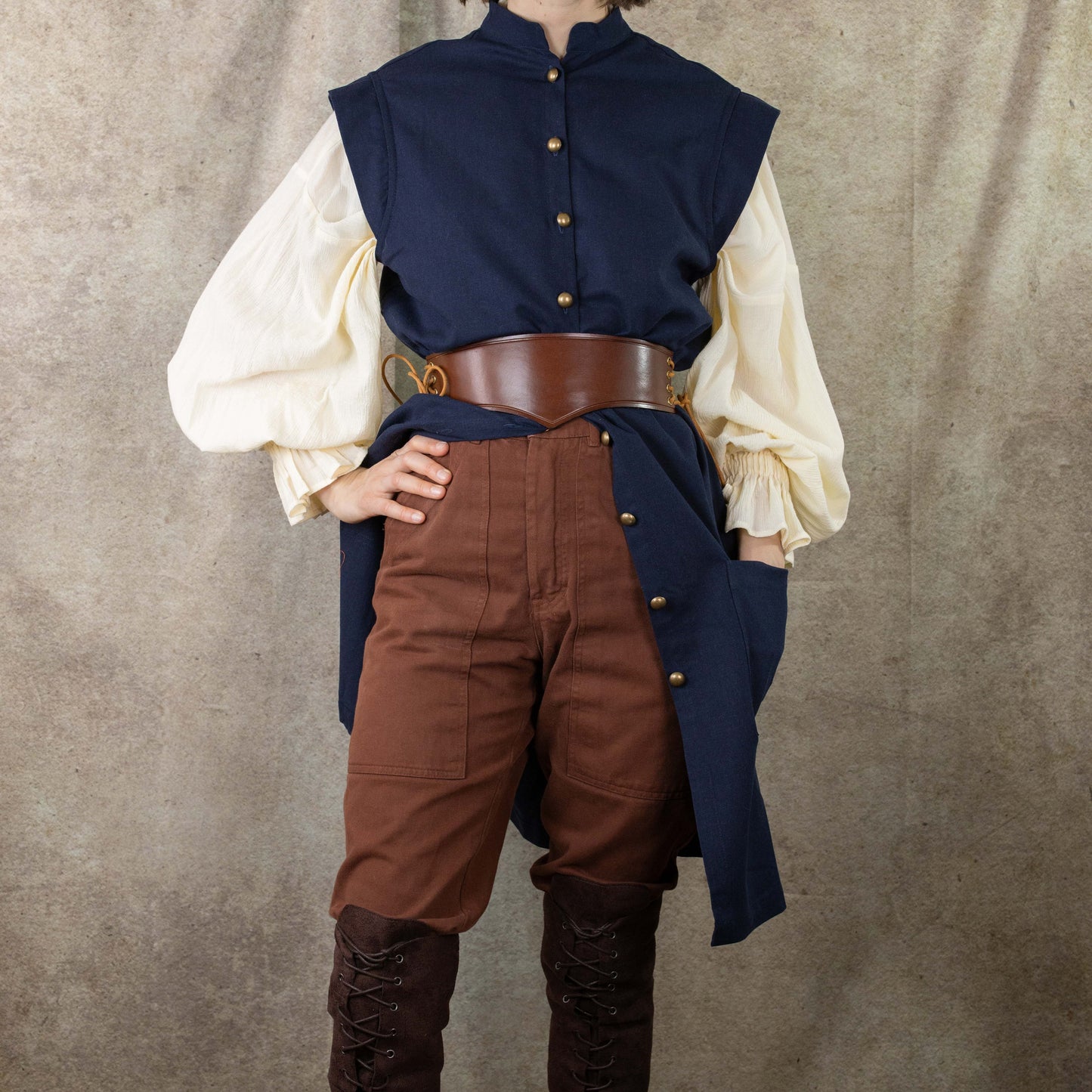 Navy Pirate Vest with cream sleeves and brown pants, styled with leather belt for renaissance costume wear