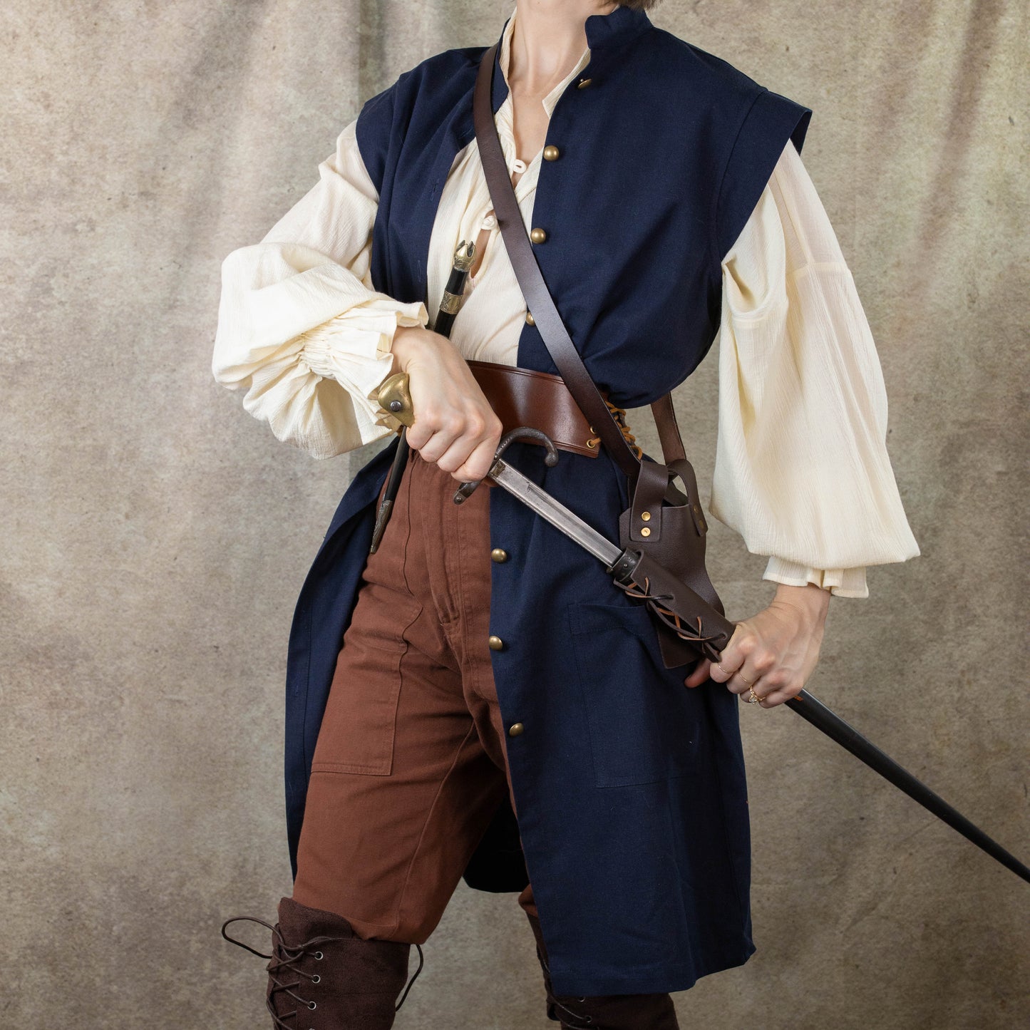 Navy Pirate Vest styled with cream shirt, brown pants and leather accessories for historical costume and renaissance faire wear