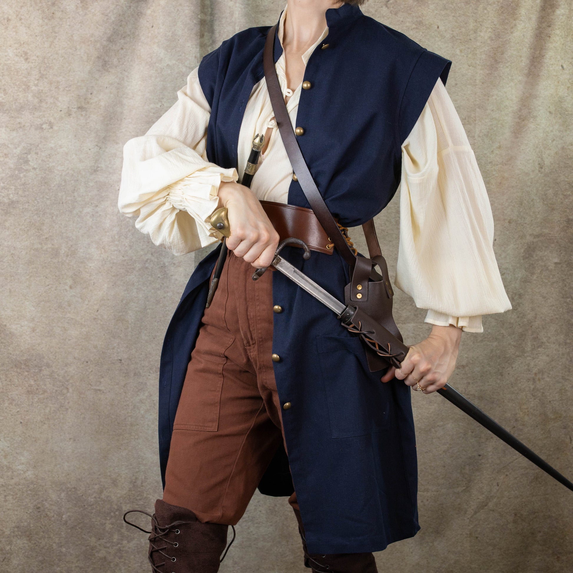 Navy Pirate Vest styled with cream shirt, brown pants and leather accessories for historical costume and renaissance faire wear