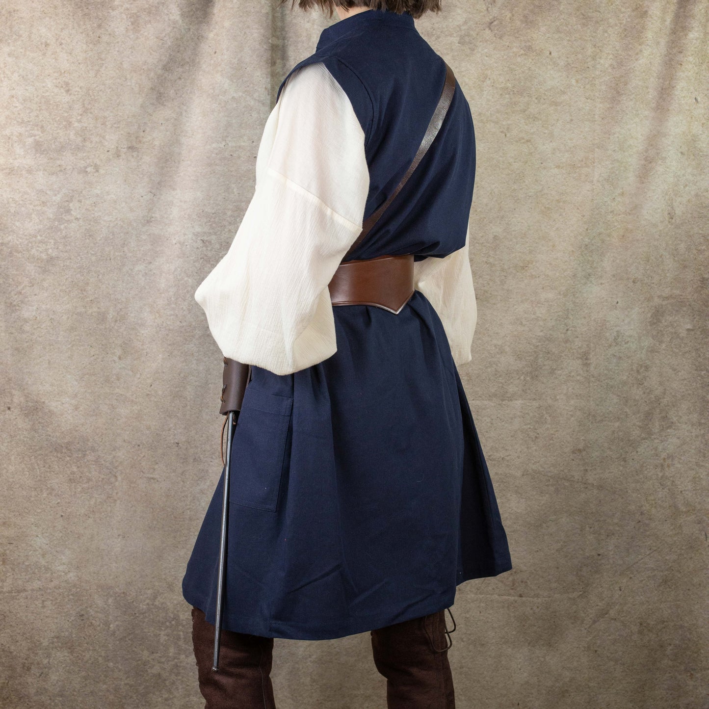 Navy Pirate Vest worn with white shirt and brown leather belt, shown from back view in renaissance costume style