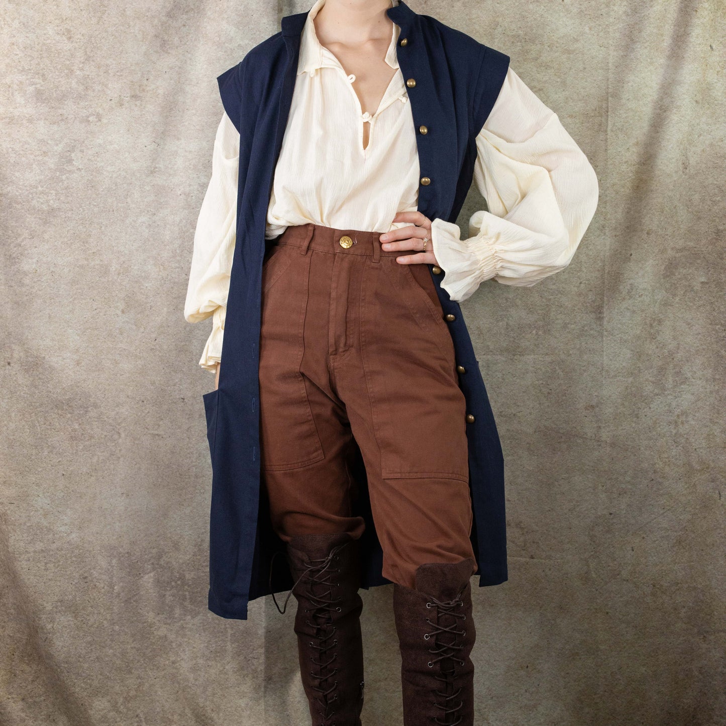 Navy Pirate Vest styled with white peasant shirt, brown breeches and boots for renaissance costume and historical reenactment