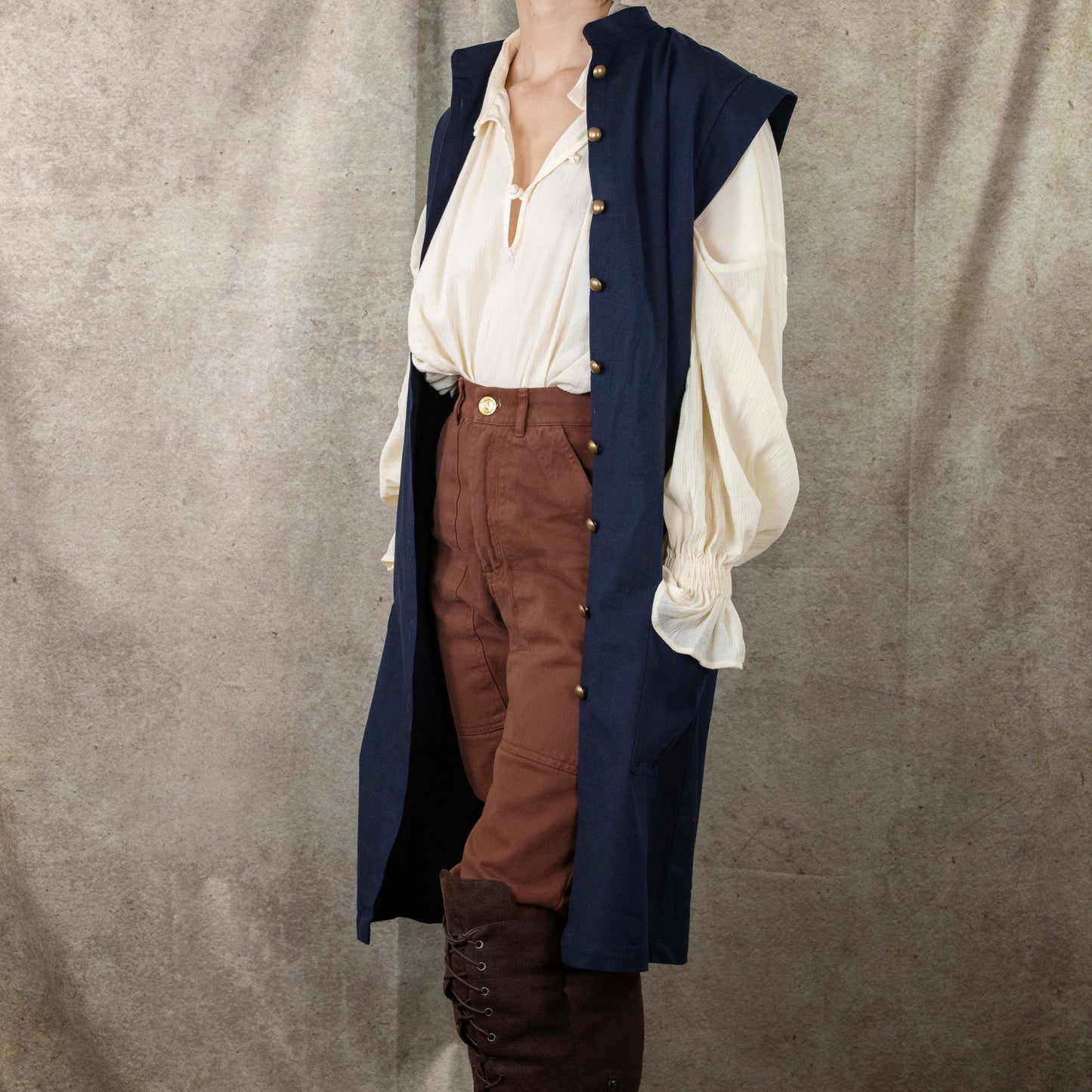 Navy Pirate Vest styled with cream peasant shirt, brown trousers and boots for renaissance faire costume