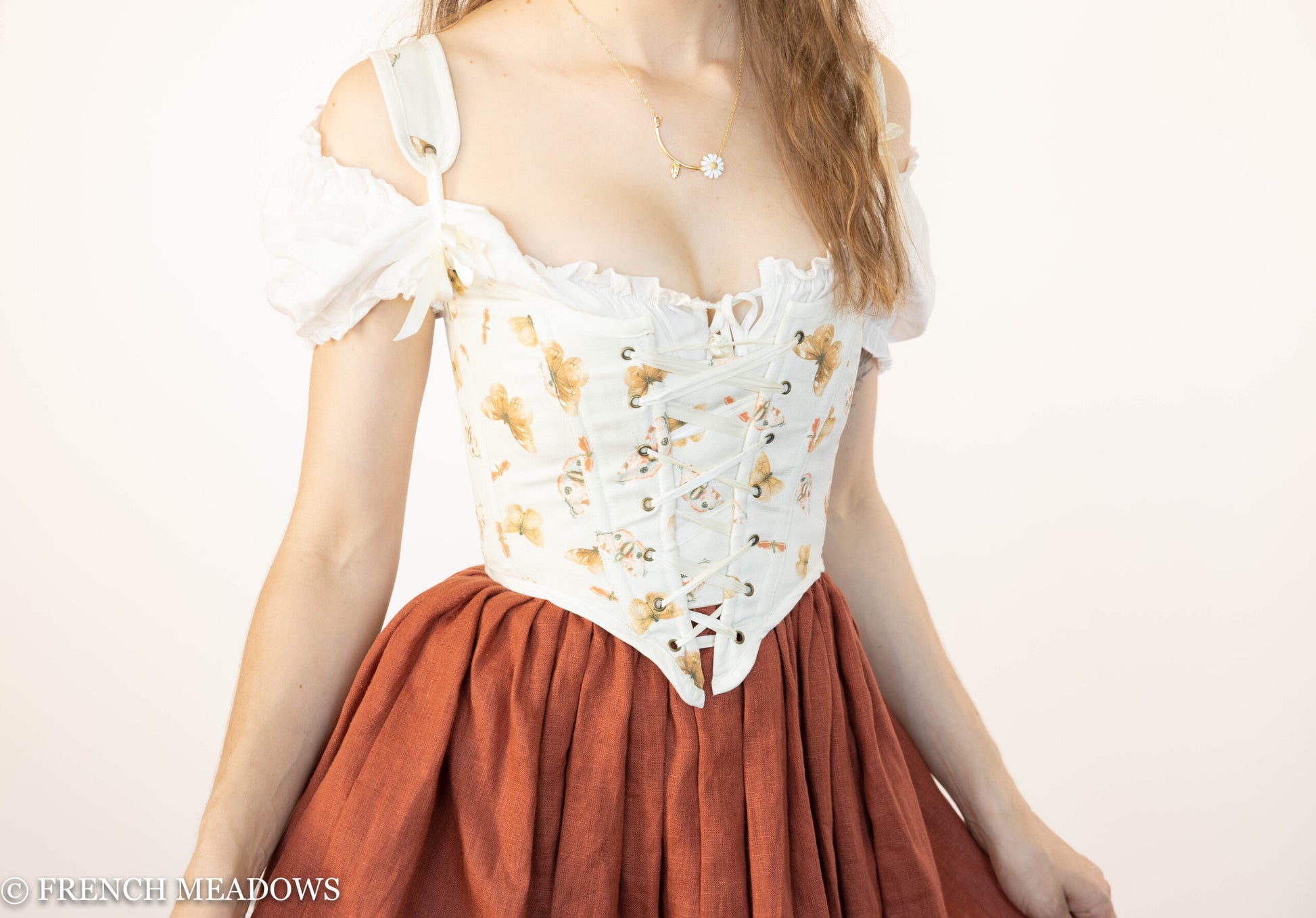 Handmade Butterfly Linen Renaissance Bodice featuring orange butterflies on ivory fabric with lace-up front and ruffled shoulders