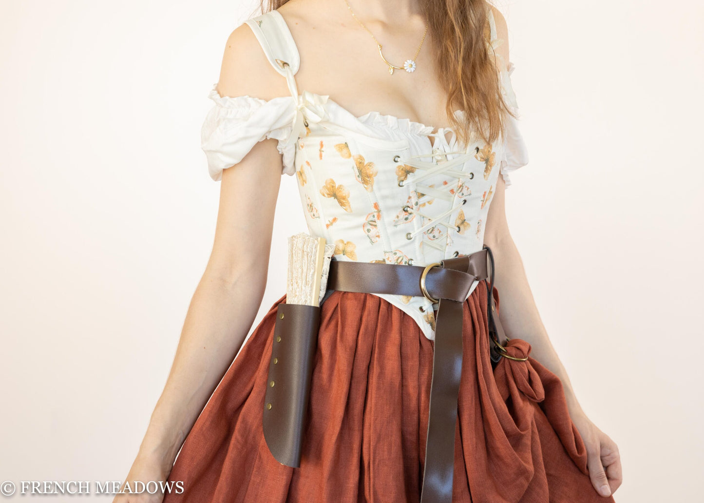 Handmade Butterfly Linen Renaissance Bodice featuring orange butterflies on ivory fabric with brown leather belt and rust skirt