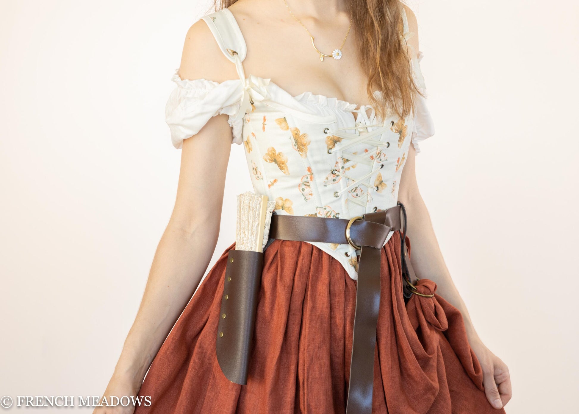 Handmade Butterfly Linen Renaissance Bodice featuring orange butterflies on ivory fabric with brown leather belt and rust skirt