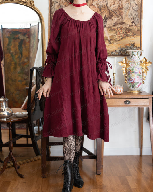 Dark Red Cotton Long Puff Sleeve Chemise shown on mannequin in vintage setting with ornate mirror and antique furniture