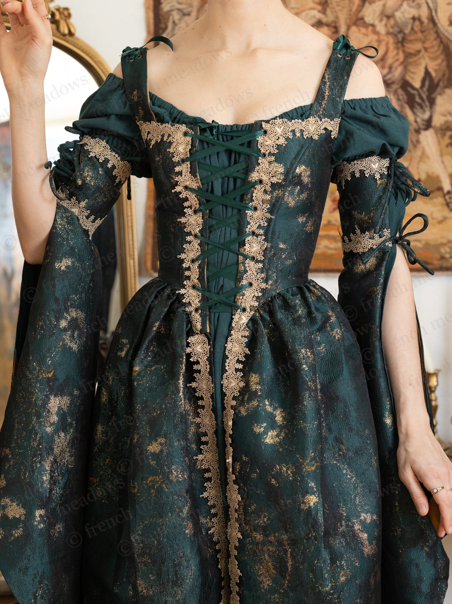 Dark Green Jacquard Corset Dress with gold trim detail, lace-up bodice and removable bell sleeves in medieval style