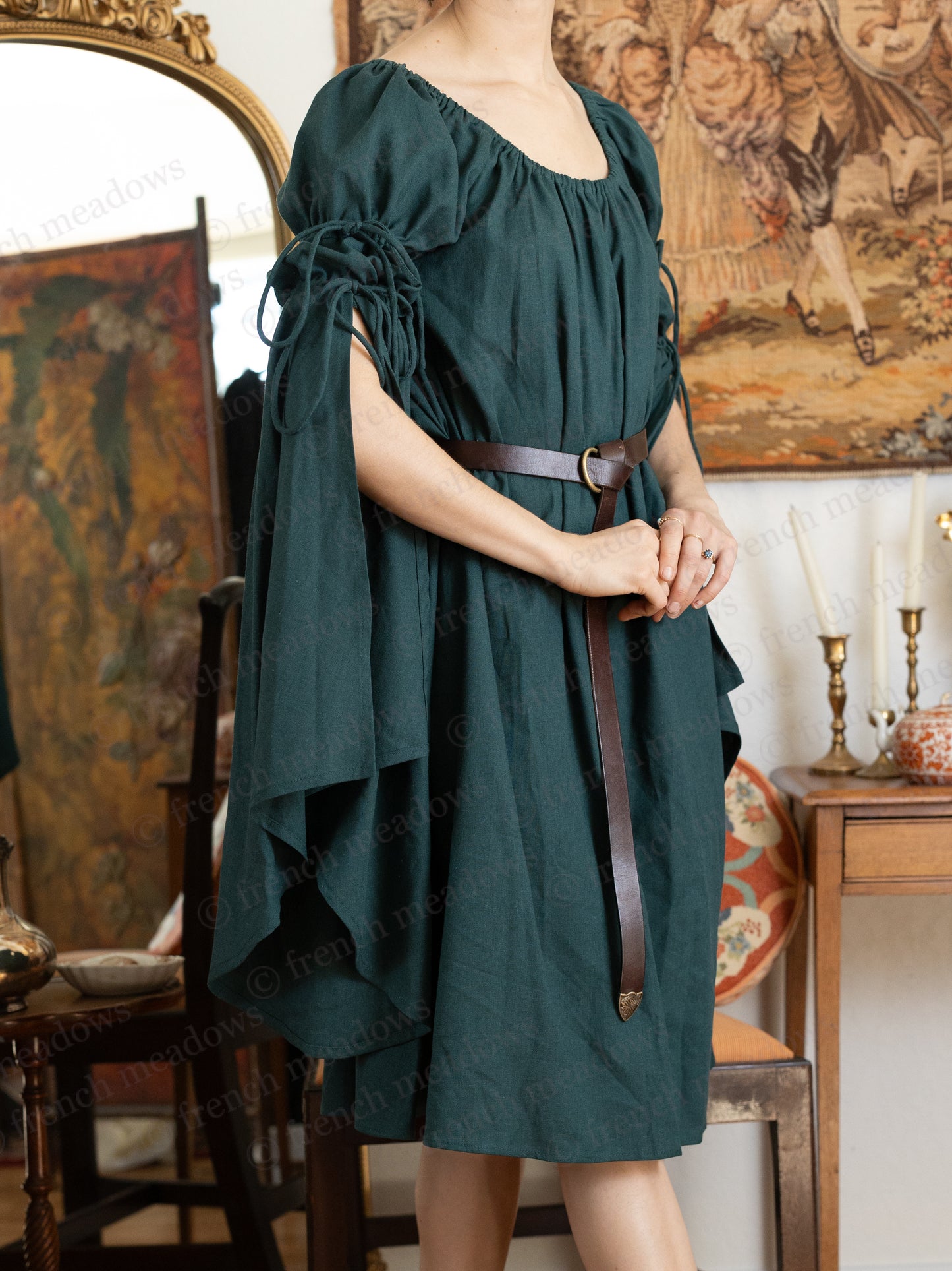 Dark Green Linen Bell Sleeve Chemise with flowing medieval design, belted at waist, shown against vintage decor setting