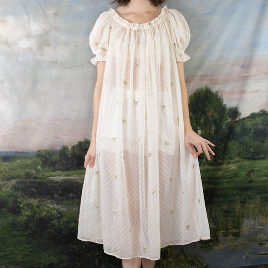 Embroidered Chiffon Chemise with puff sleeves and swiss dot pattern, shown against pastoral landscape backdrop
