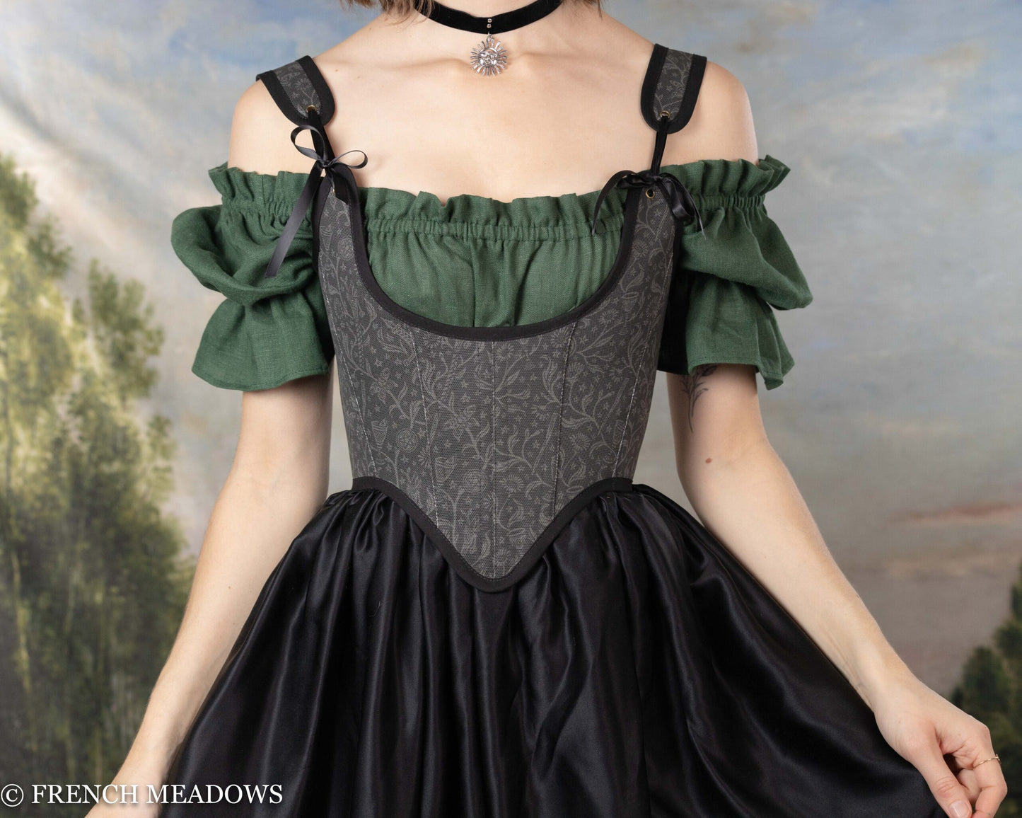 Black Tarot Underbust Bodice with green off-shoulder sleeves and tarot pattern detail on dark gray corset over flowing black skirt