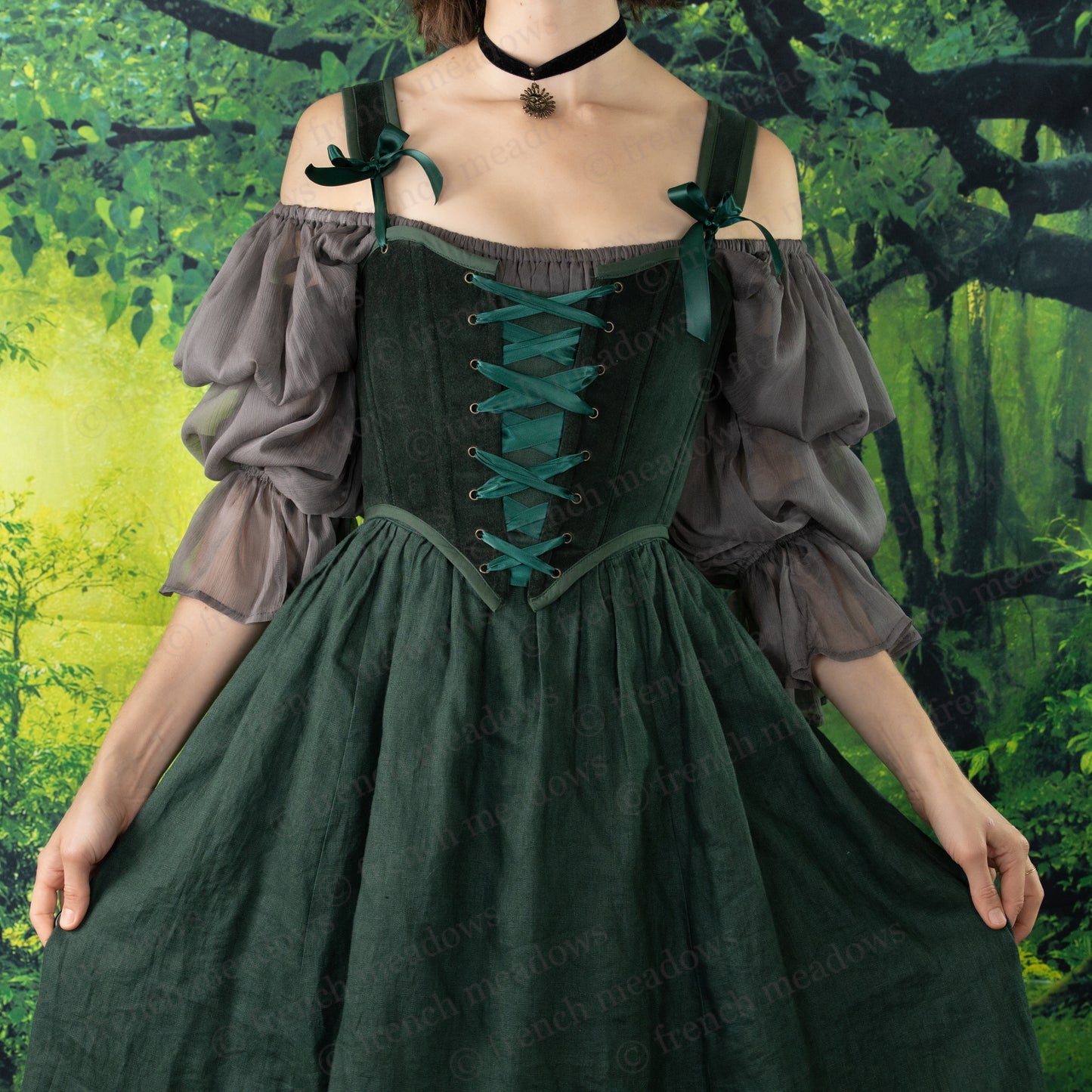 Grey Chiffon Chemise styled with dark green corset dress, puffy sleeves and shoulder ties in enchanted forest setting