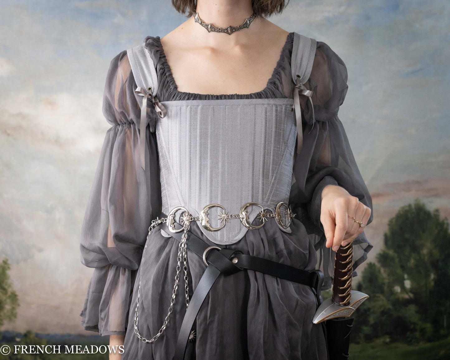 Grey Chiffon Chemise with puff sleeves and elastic neckline shown against cloudy sky backdrop