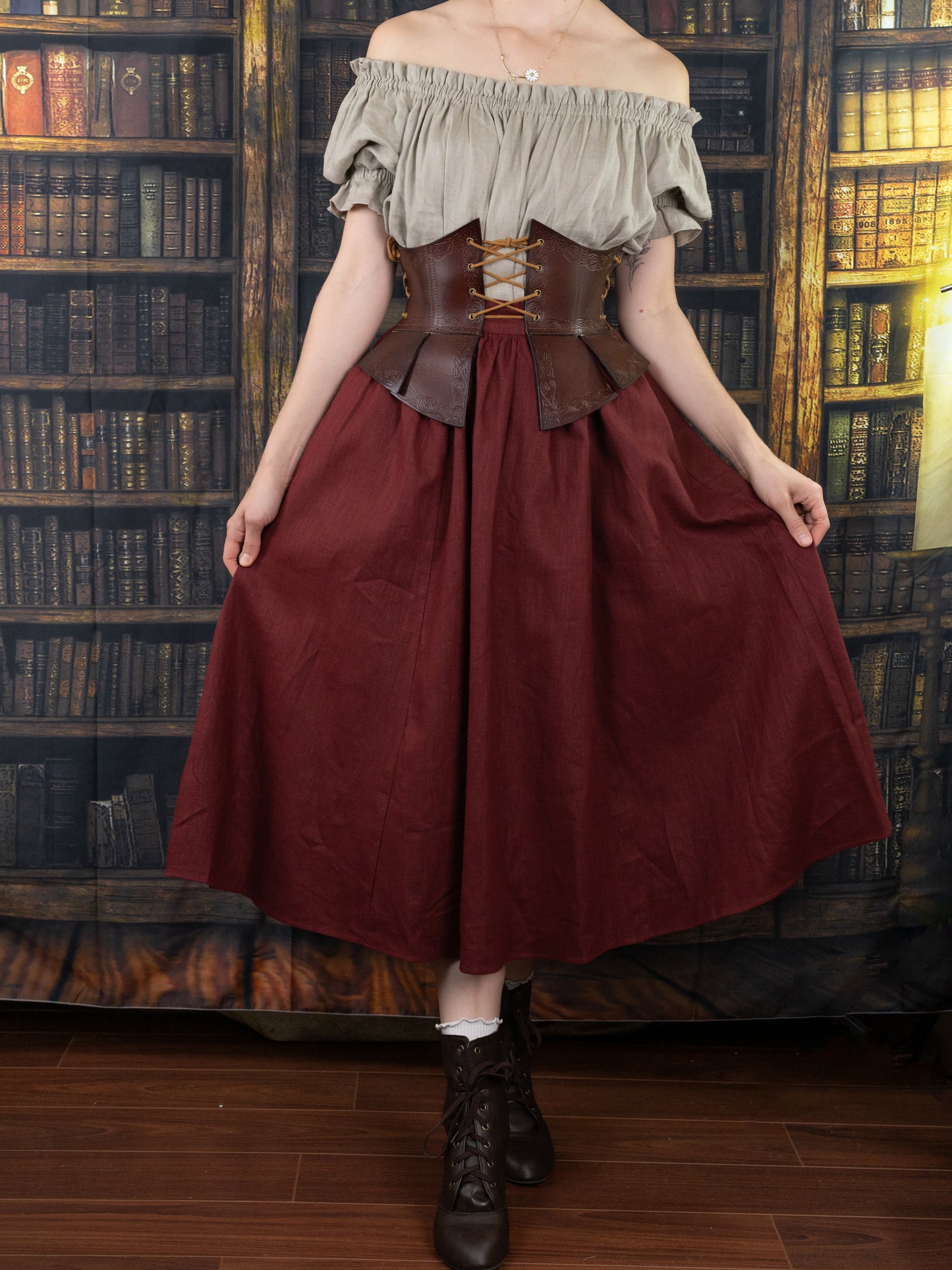 Debossed Leather Underbust Corset shown with burgundy skirt and peasant top against vintage library backdrop