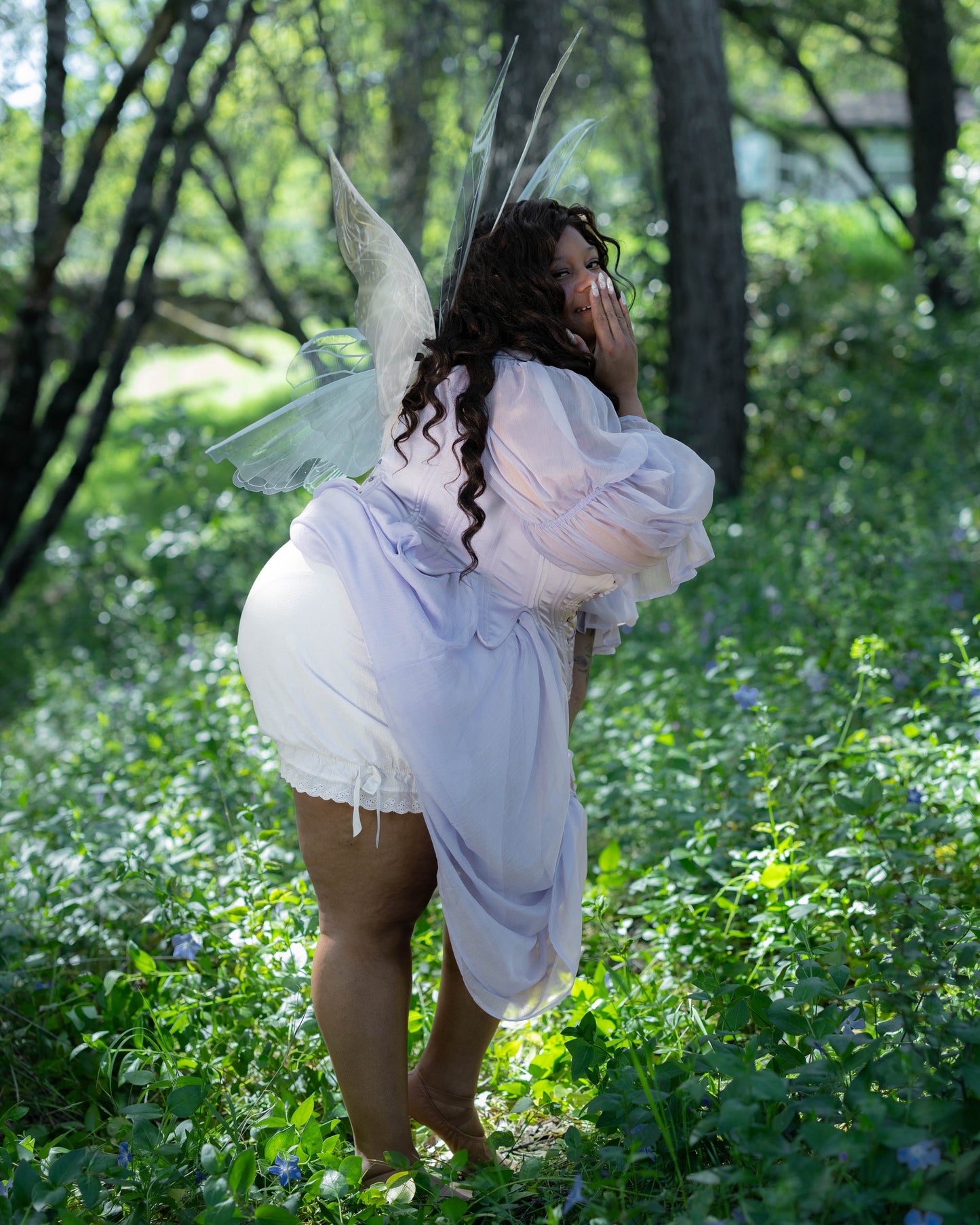 Victorian Bloomers shown worn with sheer dress in forest setting, featuring lace trim and elastic waistband.