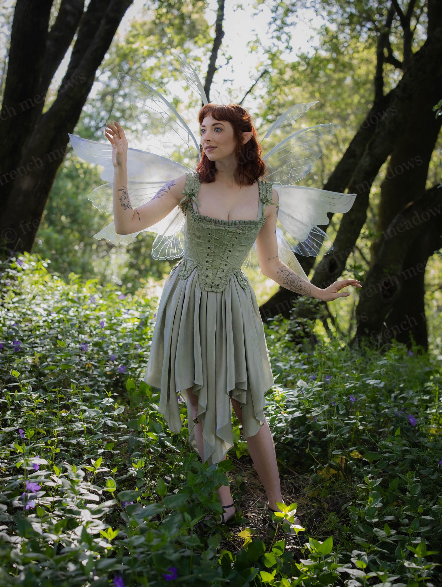 Mint Green Floral 18th Century Stays with ruffle neckline, front and back lacing, and floral satin fabric in woodland setting.