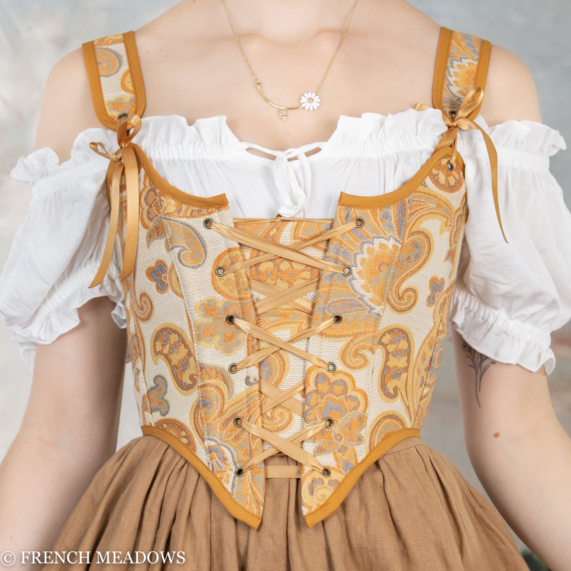 Handmade orange and yellow paisley renaissance bodice with lace-up front, gold trim and white peasant blouse