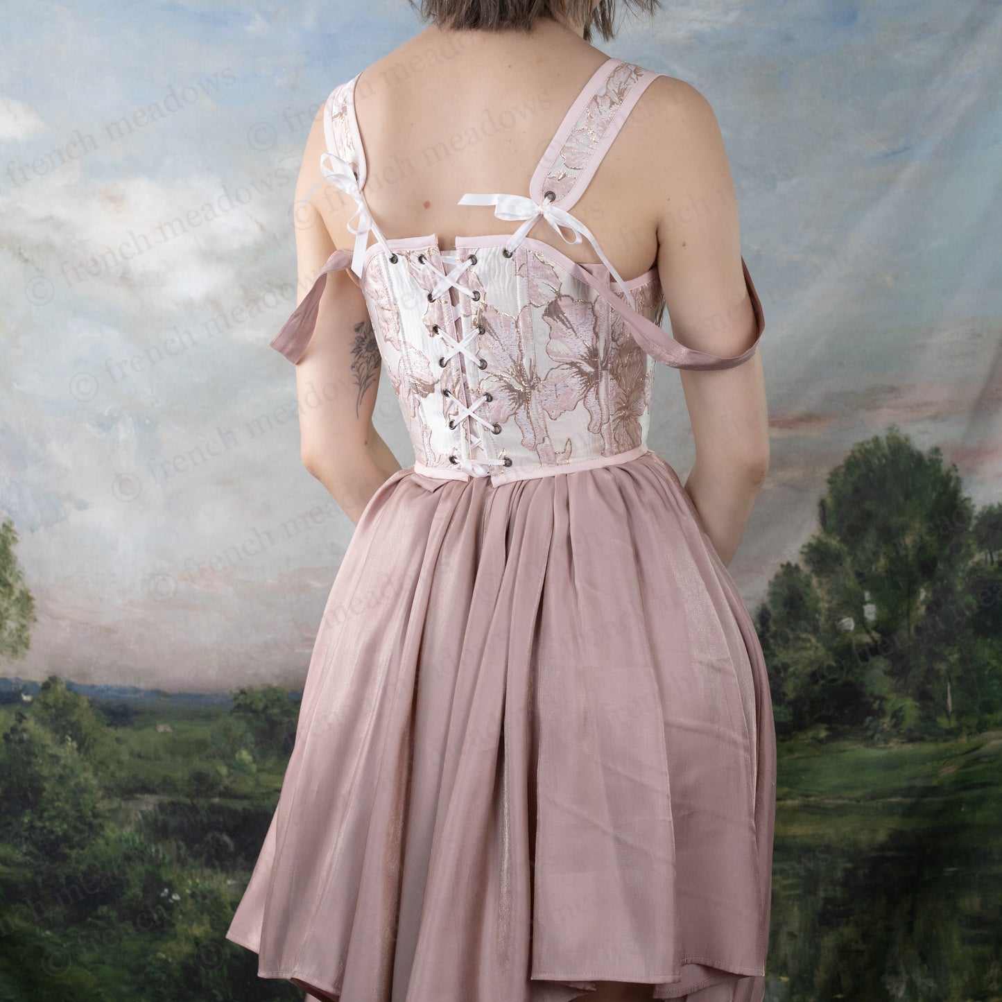 Pink and Gold Metallic Floral Corset Top with lace-up back, scoop neckline, gold floral embroidery on pink bodice, gathered skirt