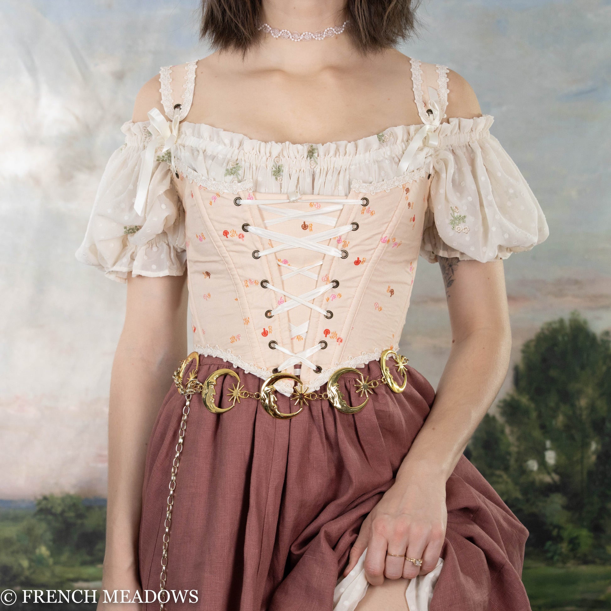 Handmade Ditsy Mushroom Renaissance Bodice with lace-up front, puff sleeves, daisy trim, and pink mushroom print on cream fabric
