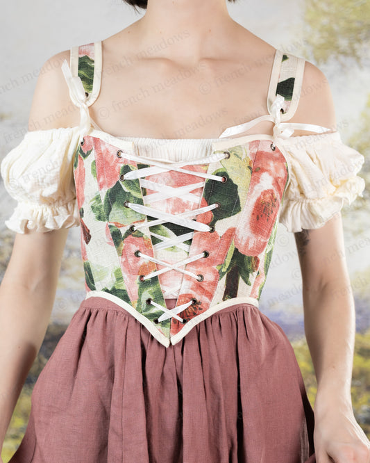 Pink Peony Floral Corset Top with watercolor floral print, lace-up front, off-shoulder sleeves and adjustable straps on linen fabric
