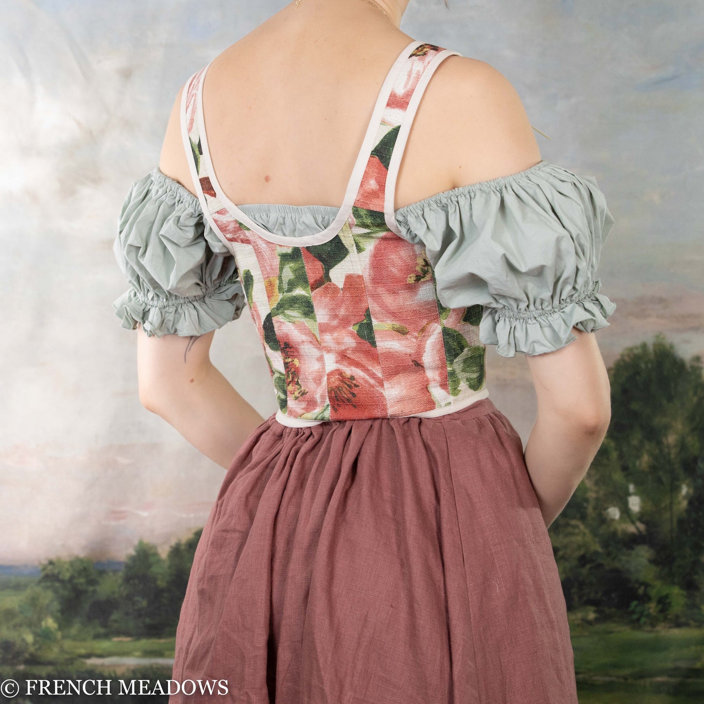 Pink Peony Renaissance Bodice featuring watercolor floral print with puffed gray sleeves and mauve skirt, shown from back view