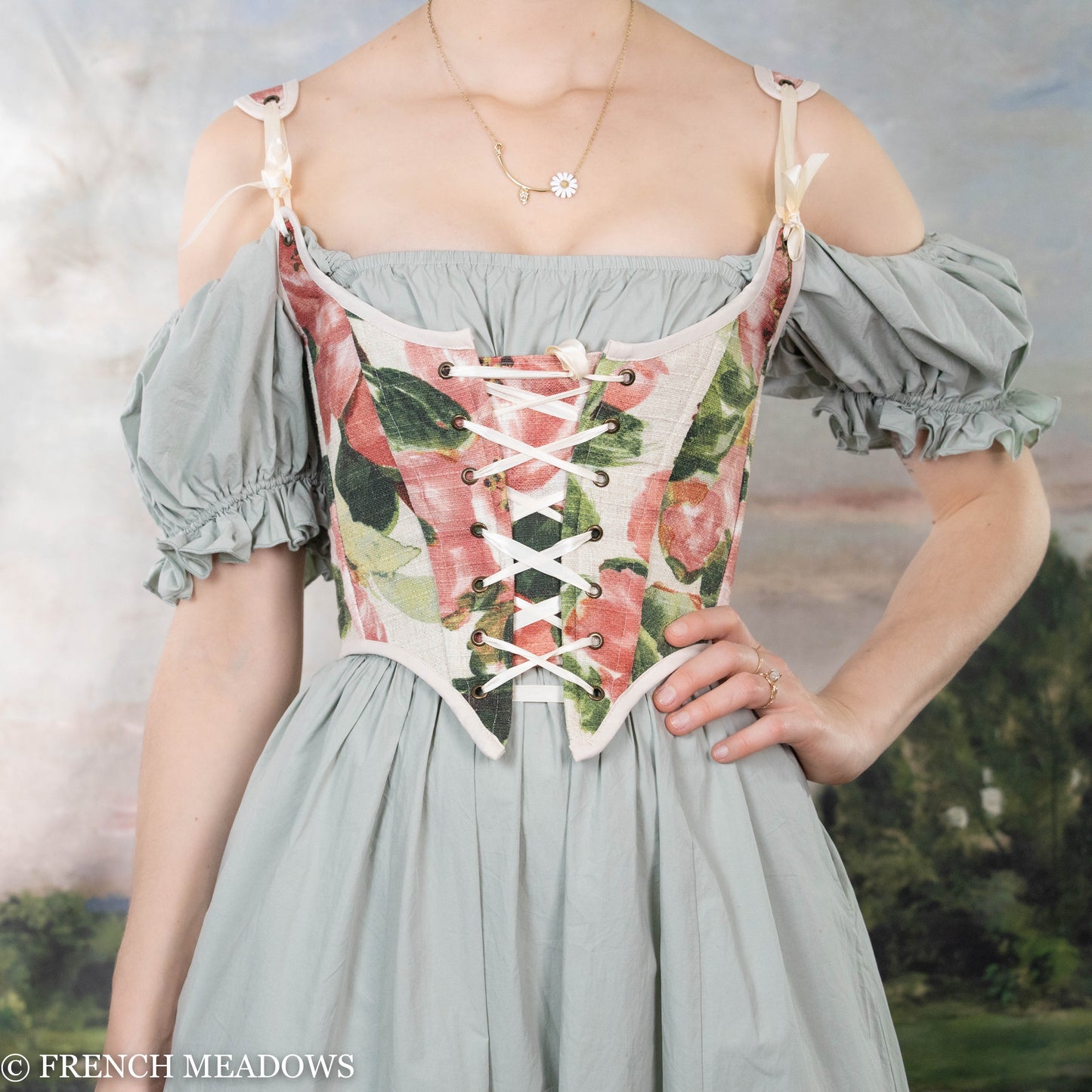 Handmade Pink Peony Renaissance Bodice featuring floral print corset with lace-up front and off-shoulder puff sleeves in sage green