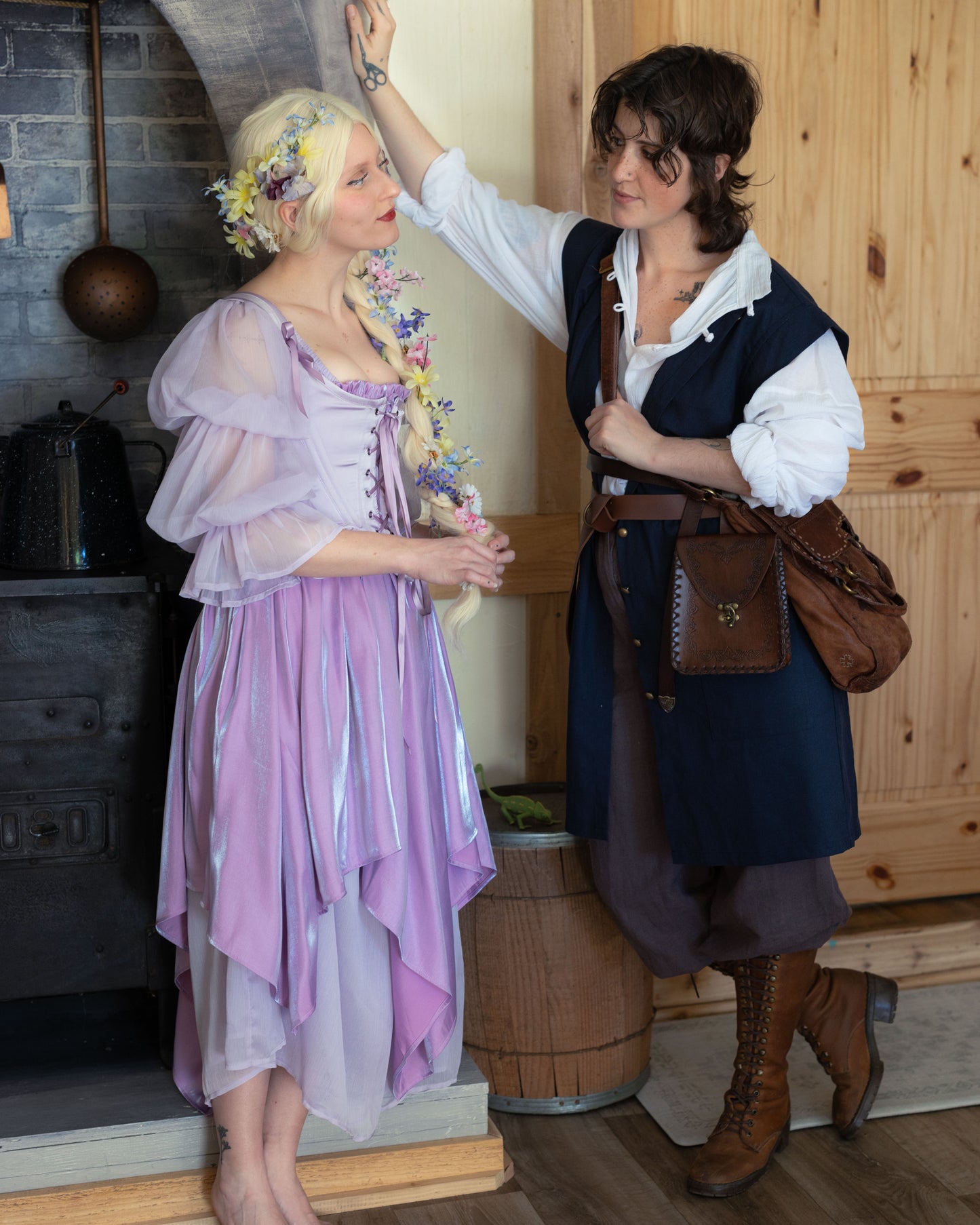 Navy Pirate Vest shown in romantic renaissance faire scene with historical costumes and medieval-inspired styling