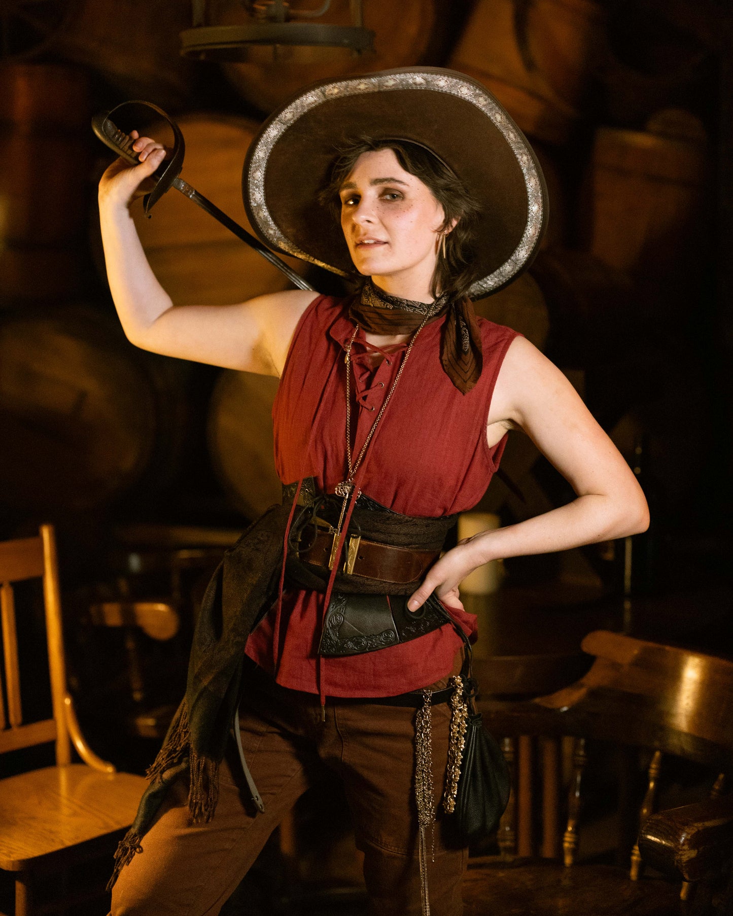 Debossed Leather Underbust Corset shown in warm lighting with medieval-styled patterned leather and adjustable waist tabs
