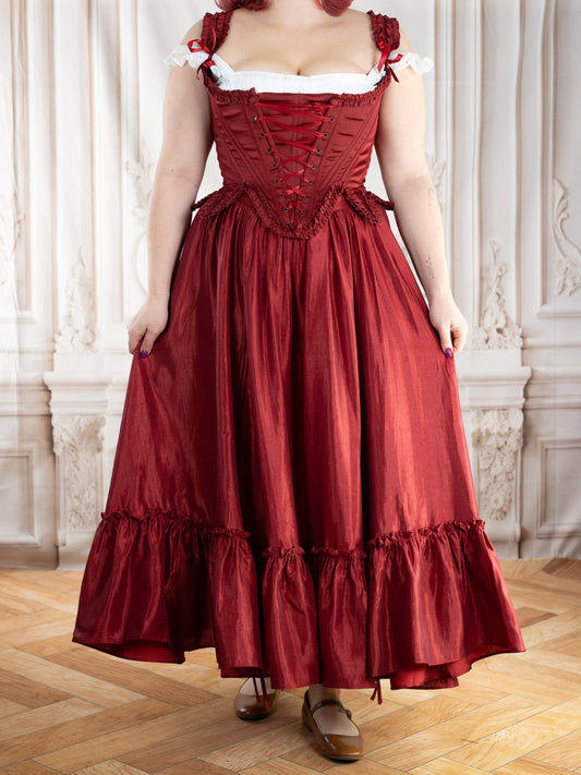 Red Satin 18th Century Stays with elegant ruffle trims and lace-up front creating a dramatic rococo silhouette