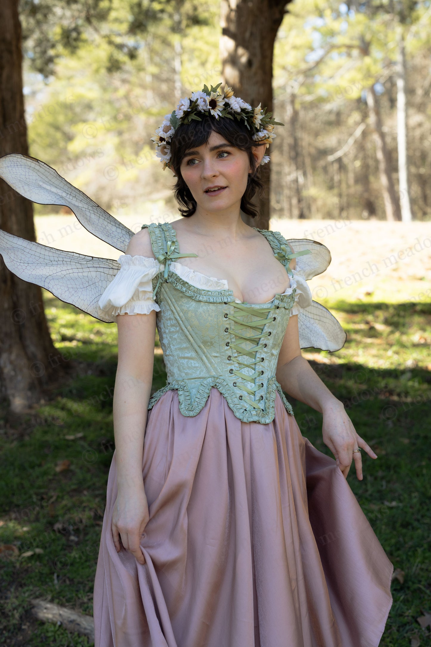 Mint Green Floral 18th Century Stays with ruffled neckline and waist in light green satin floral fabric.