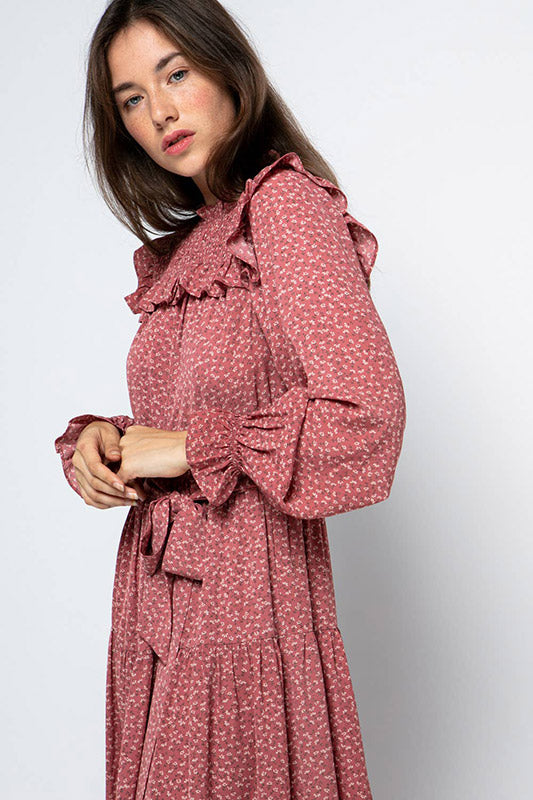 Ruffled Prairie Dress in mauve with delicate floral print, featuring bishop sleeves, smocked bodice and tiered skirt design