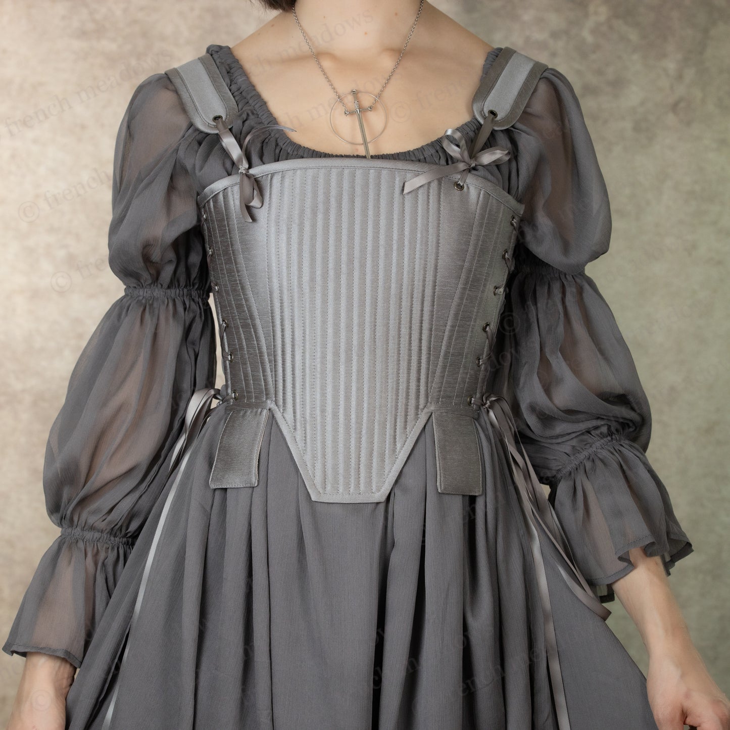 Silver Tabbed Tudor Stays shown in gray with boned bodice, puff sleeves, and ornamental square waist tabs for historical costume wear
