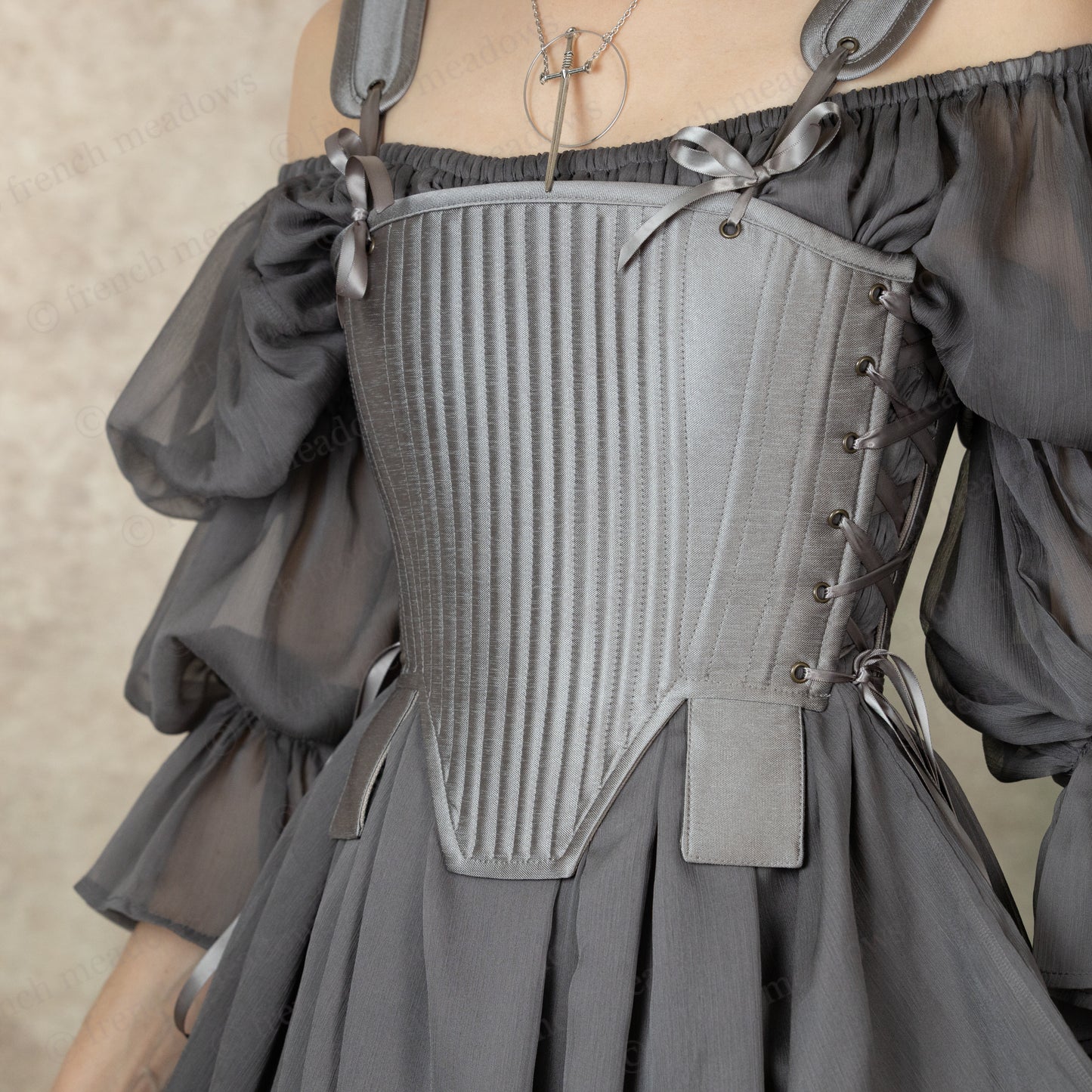 Silver Tabbed Tudor Stays with boned bodice, side lacing, and decorative waist tabs in grey, featuring puffed sleeves and pleated skirt