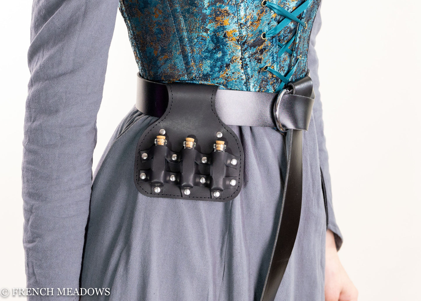 Potion Bottle Pouch in black vegan leather attached to belt, featuring four glass vials with decorative metal studs