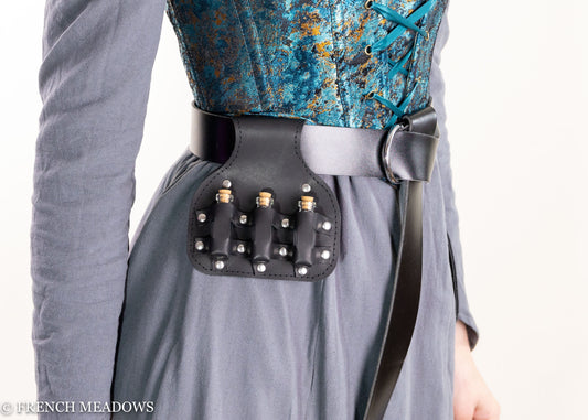 Potion Bottle Pouch in black vegan leather attached to belt, featuring four glass vials with decorative metal studs