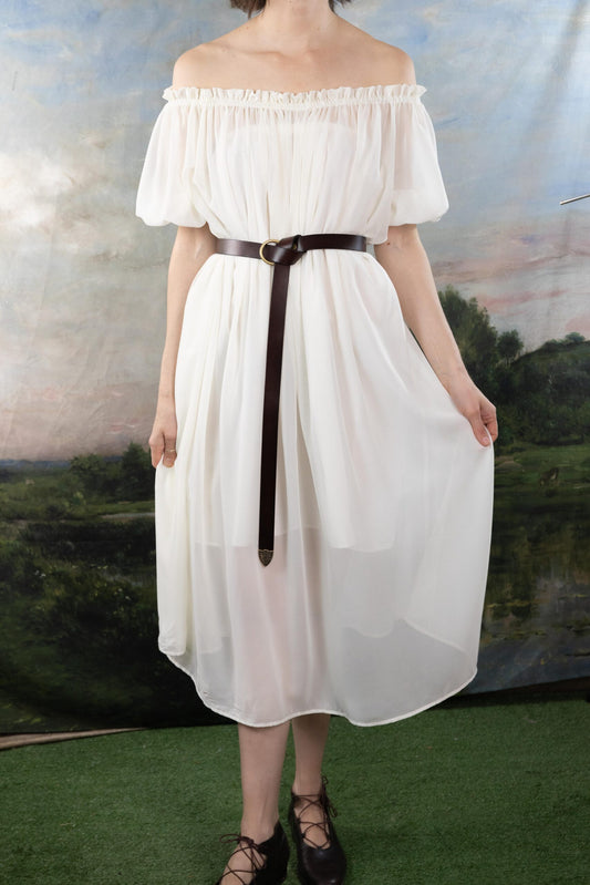 Ruffle Sleeve Ivory Chiffon Chemise shown with brown belt, off-shoulder design against pastoral backdrop