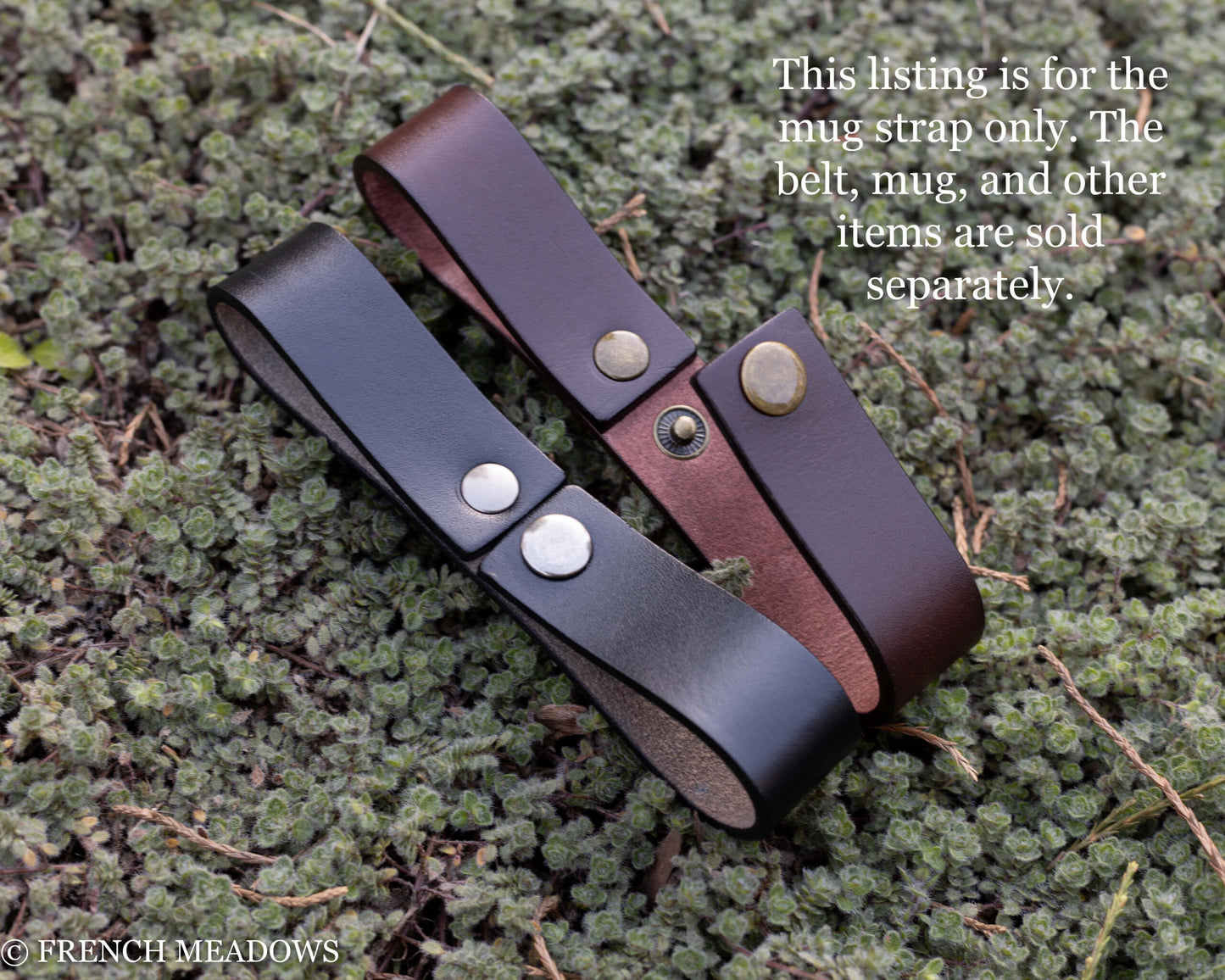 Leather Tankard Strap in black and brown with metal snaps shown on mossy background for medieval and renaissance costumes