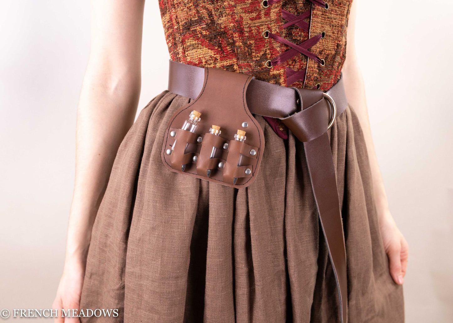 Brown leather Potion Bottle Pouch with three glass vials attached to belt loop, perfect for Renaissance costume accessories