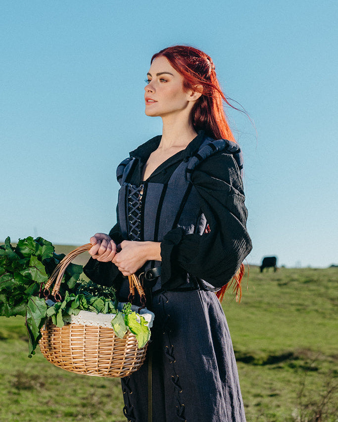 Woman outdoors in portrait wearing Navy Tavern Bodice with basket of greens on a sunny day in FrenchMeadows LS-45.jpg