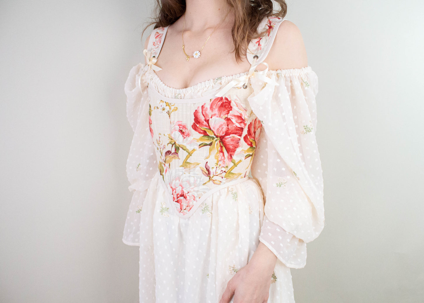 Handmade Covington Tea Rose Corset with pink floral bodice and delicate off-shoulder puff sleeves in cottagecore style