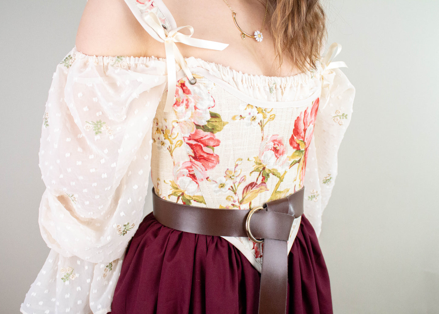 Handmade Covington Tea Rose Corset with floral pink bodice and puffed sheer off-shoulder sleeves in cottagecore style