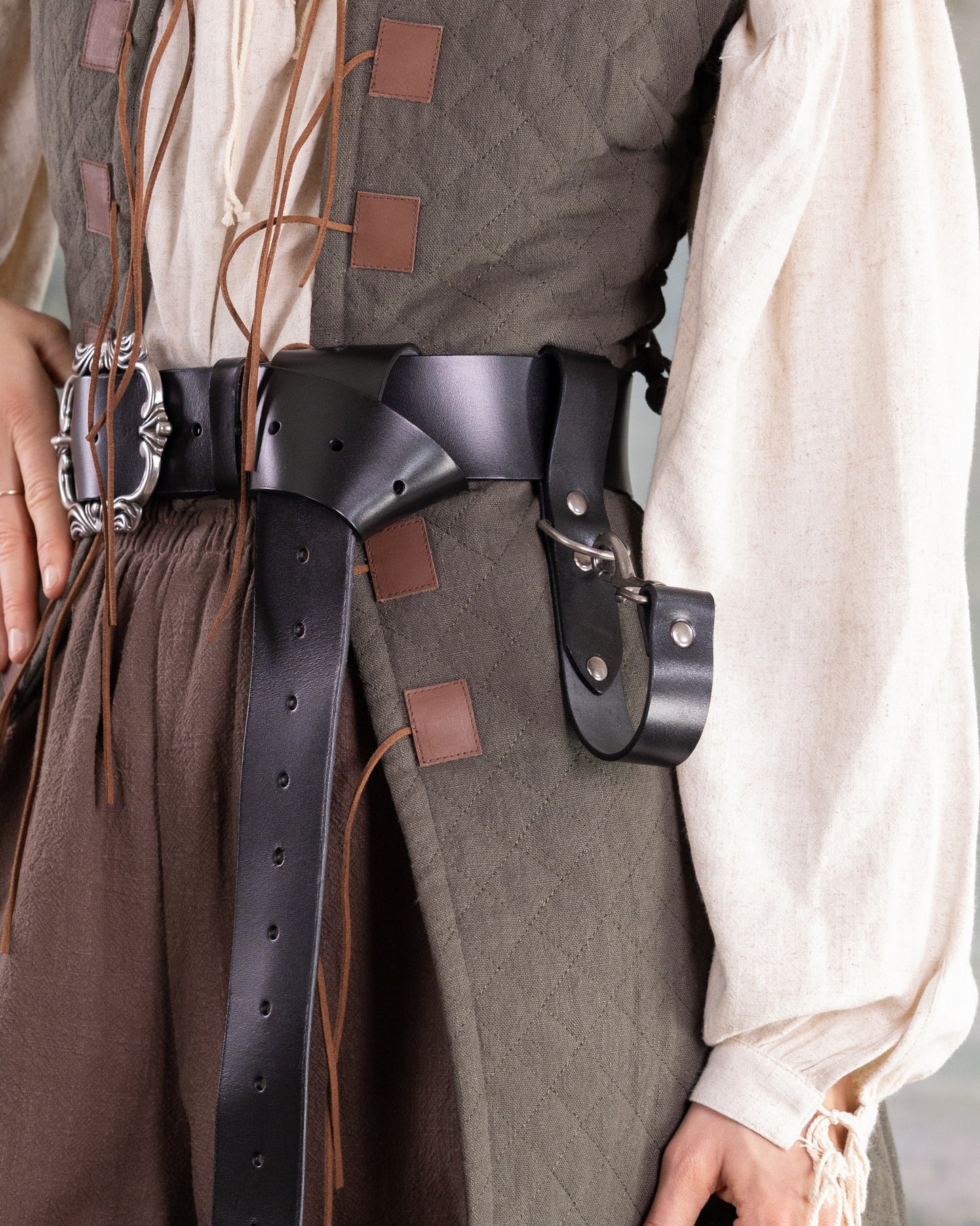 Heavy Duty Leather Tankard Strap attached to costume belt holding a mug, featuring metal clasp and sturdy leather design
