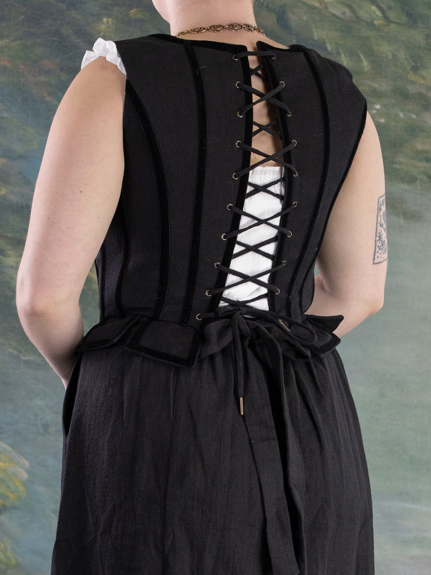 Black Pirate Doublet showing back lace-up detail and peplum, portrait orientation, gallery image six of product shots
