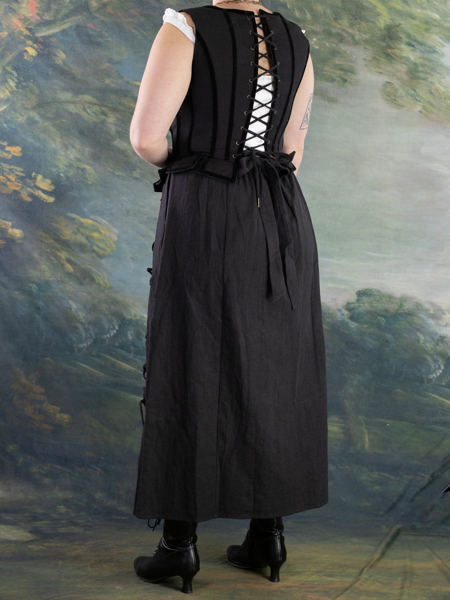 Black Pirate Doublet shown from back with laced design and bow tie, portrait orientation, image five in gallery.