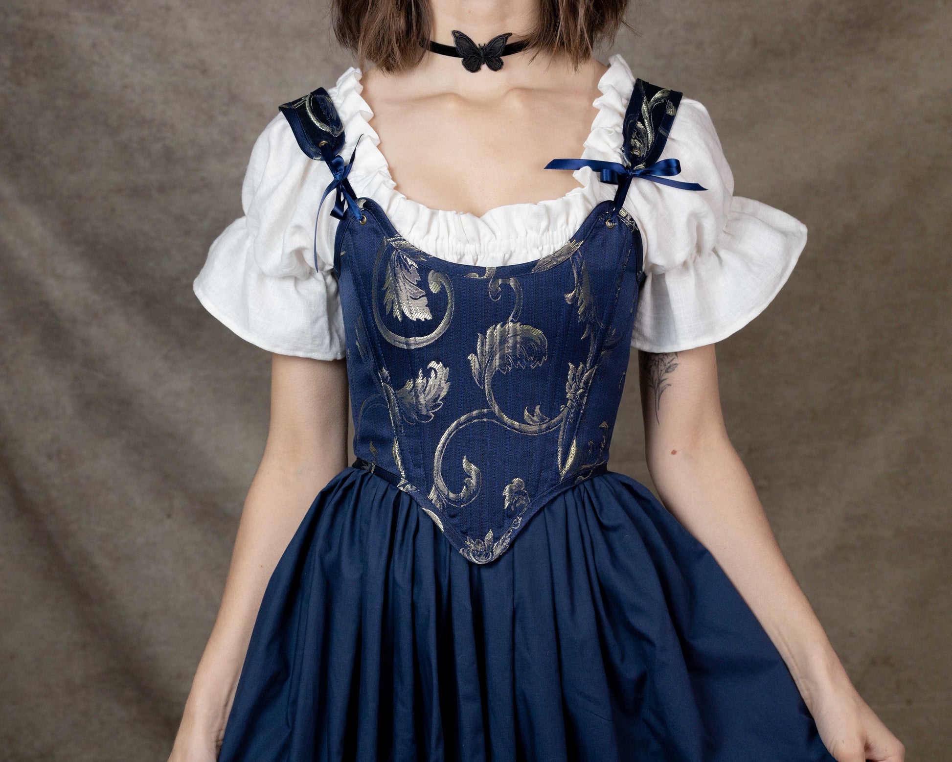 Handmade Blue and Gold Jacquard Stays with blue floral bodice, adjustable straps, and navy skirt in princess and knight style