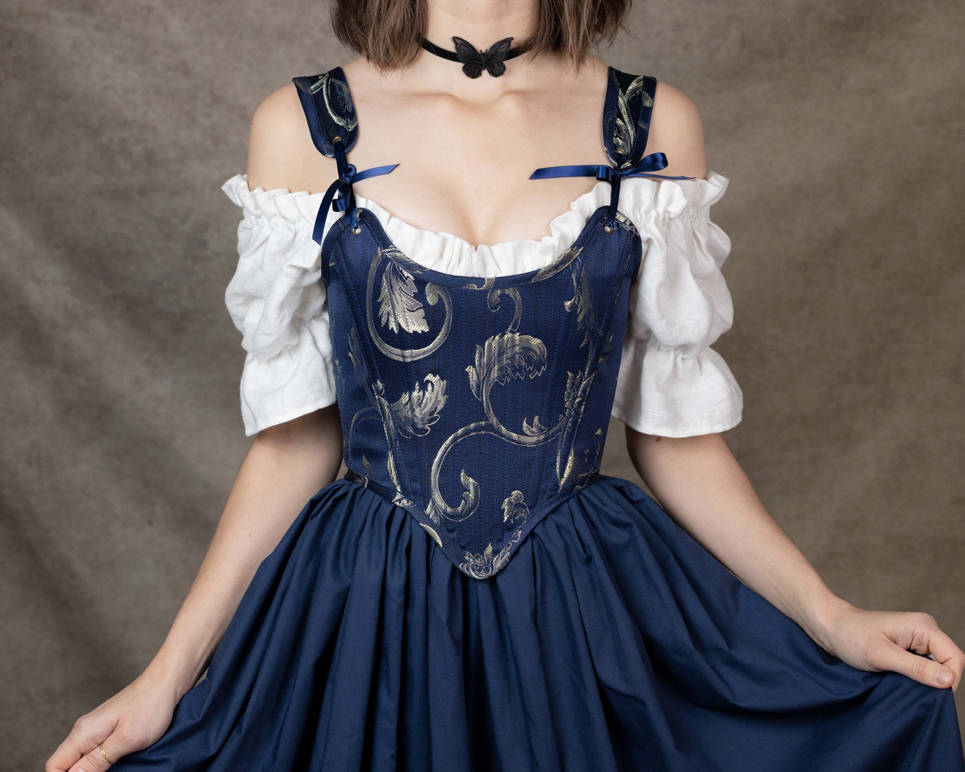 Handmade Blue and Gold Jacquard Stays with floral bodice, adjustable straps, and navy skirt in princess and knight aesthetic